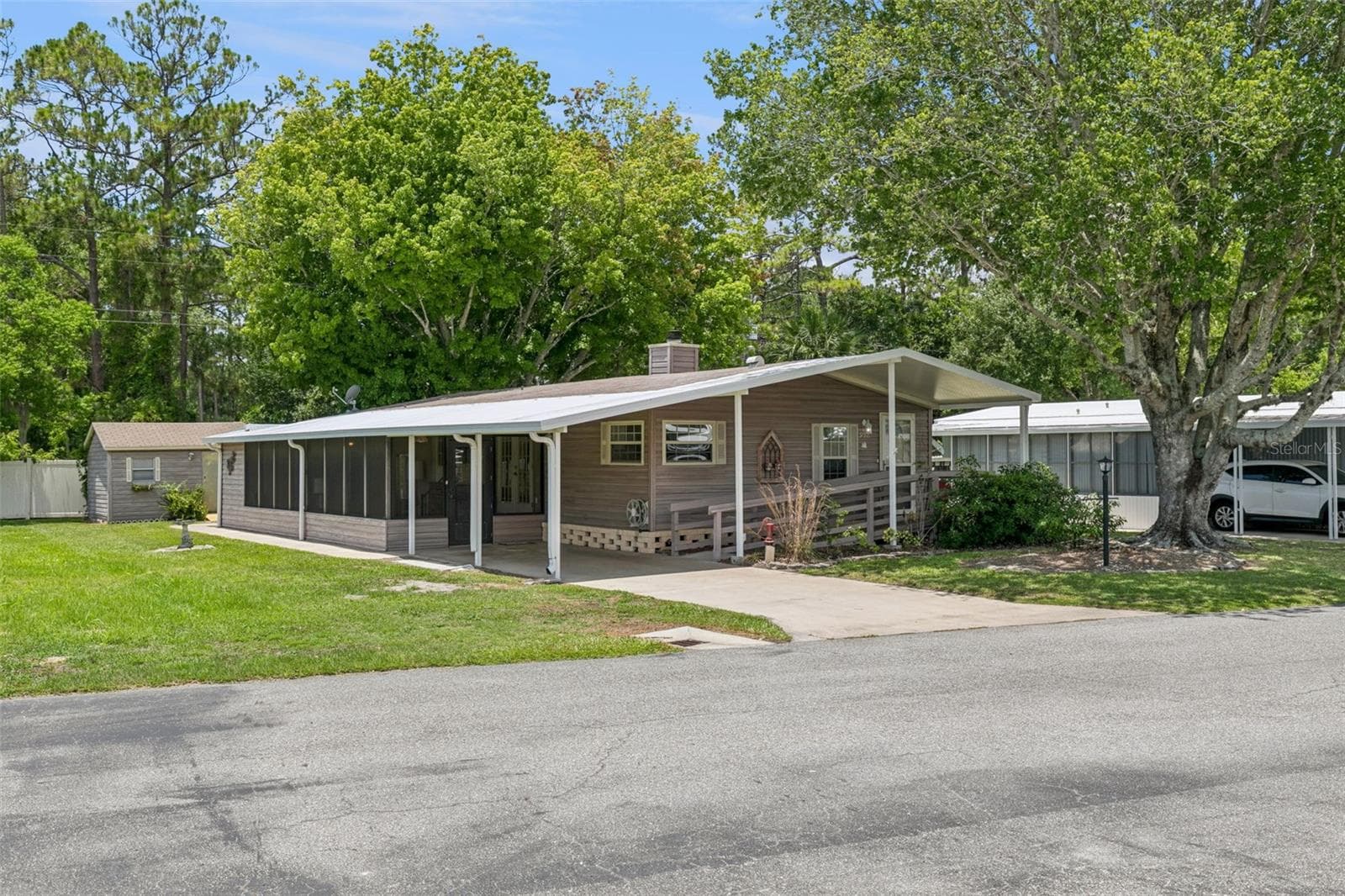 Manufactured Home at 938 BLUE HERON BLVD, OSTEEN, photo 2 of 42