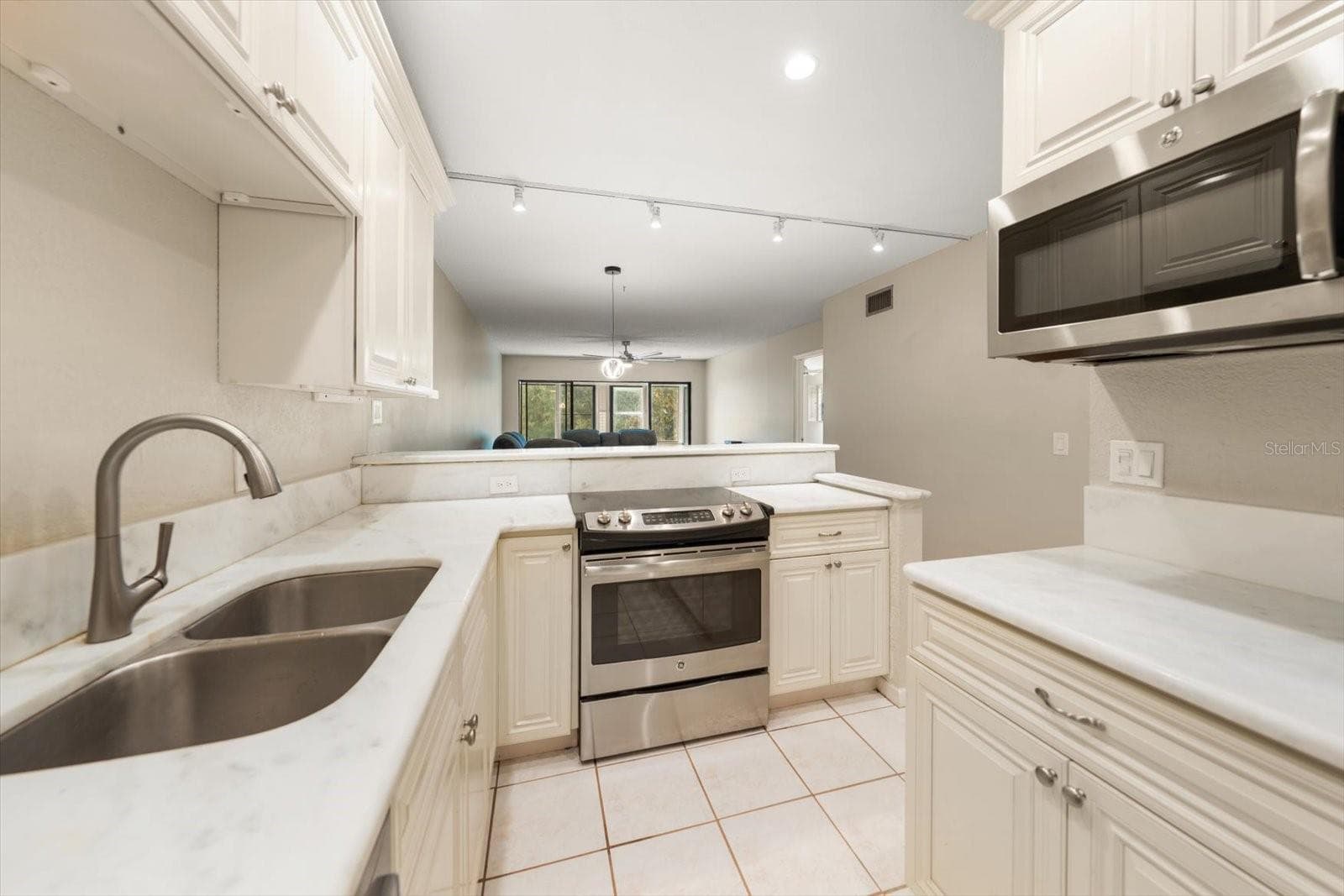 Condominium at 1750 BELLEAIR FOREST DR #B8, BELLEAIR, photo 10 of 43