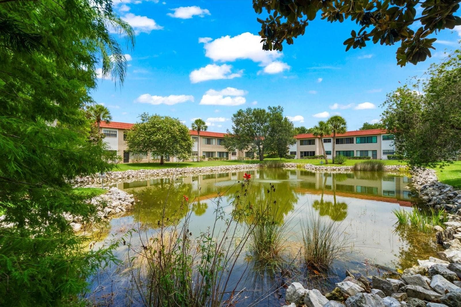 Condominium at 1750 BELLEAIR FOREST DR #B8, BELLEAIR, photo 40 of 43
