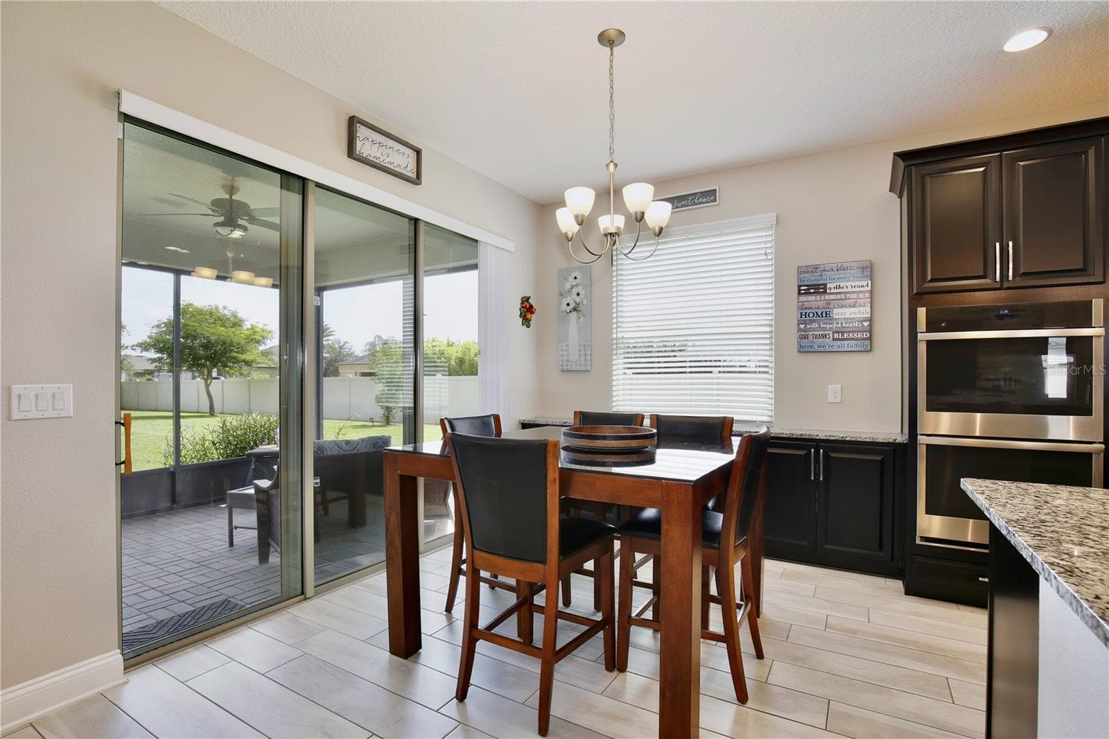EAT IN AREA WITH ADDED CABINETS - 3266 KAYAK WAY, ORLANDO