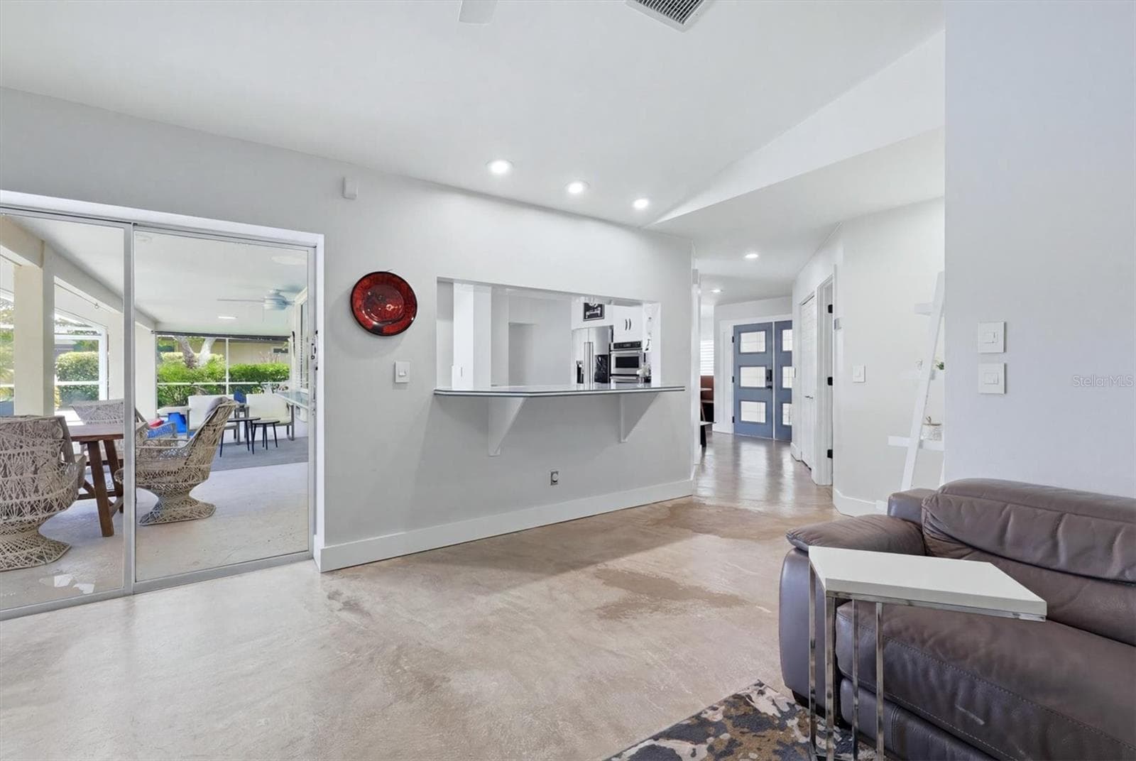 View from the Family Room to the Pool Lanai & Kitchen Pass-Through - 3900 TORREY PINES BLVD, SARASOTA