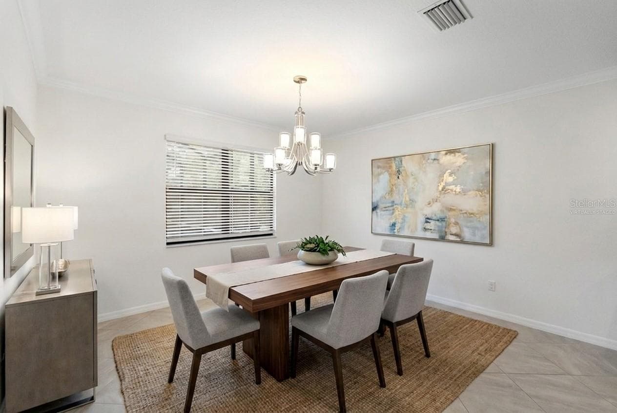 virtually staged -dining room - 9730 CARNOUSTIE PL, BRADENTON