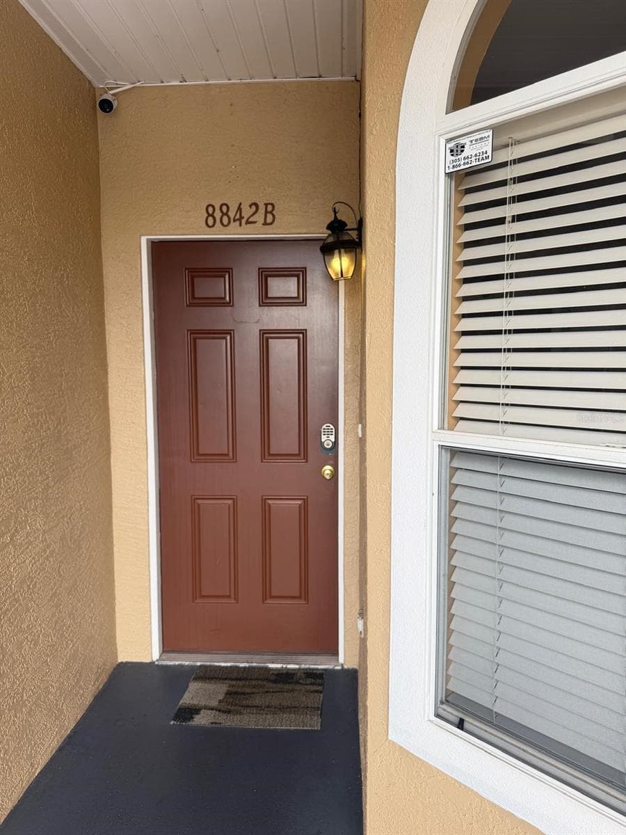 Condominium at 8842 CORAL PALMS CT #B, KISSIMMEE, photo 3 of 36