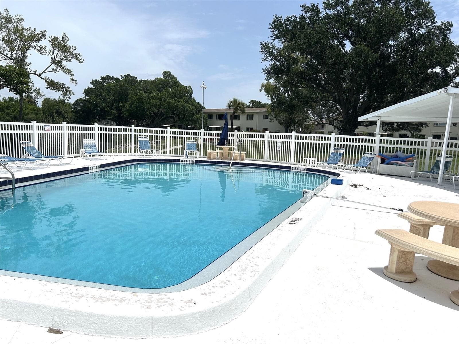 Community Pool next to Clubhouse. - 4520 OVERLOOK DR NE #132, ST PETERSBURG