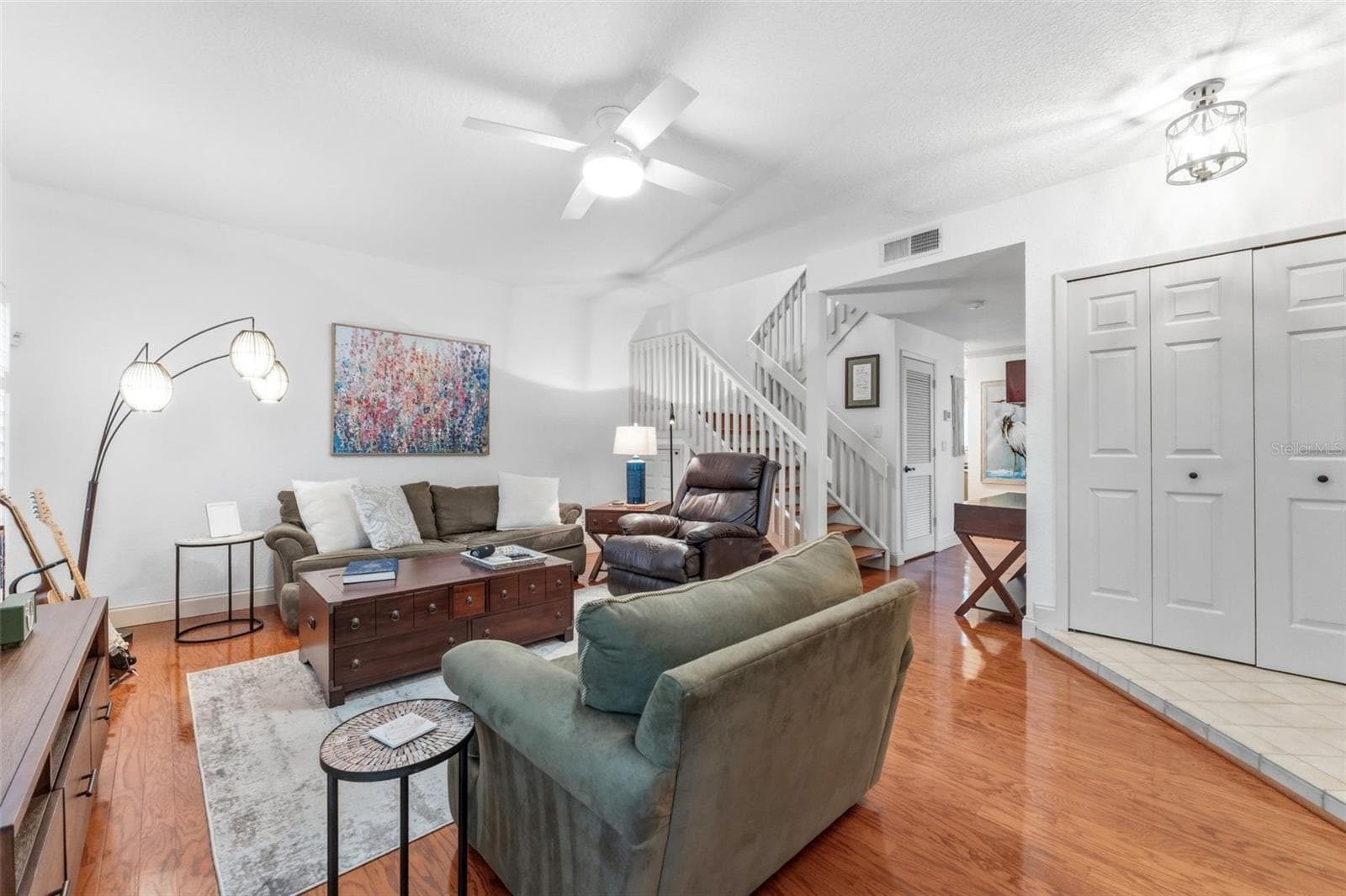 View of Living room from fireplace - 3460 COUNTRYSIDE BLVD #66, CLEARWATER