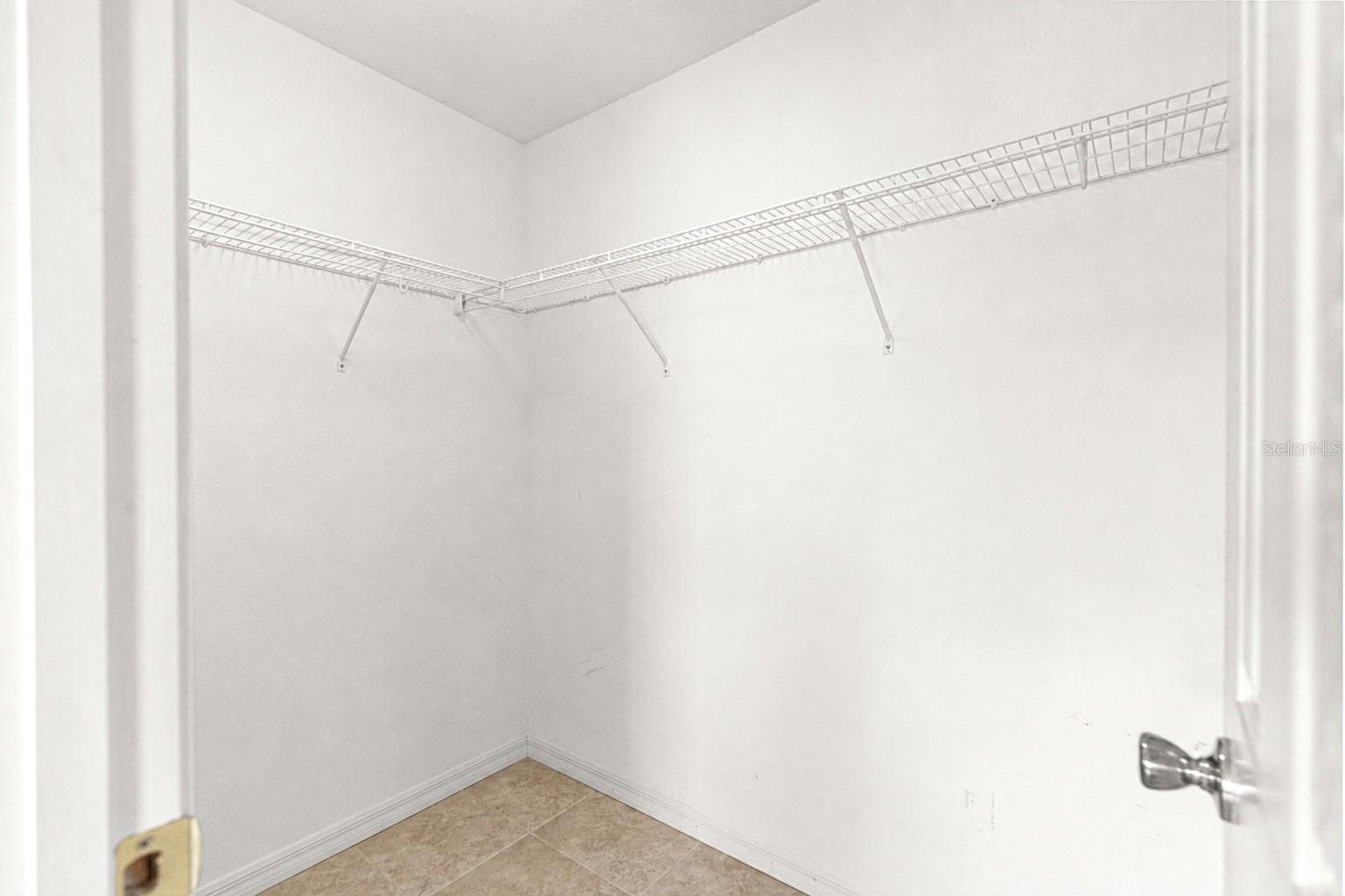 primary walk-in closet - 4 CEDAR TRACE PASS, OCALA