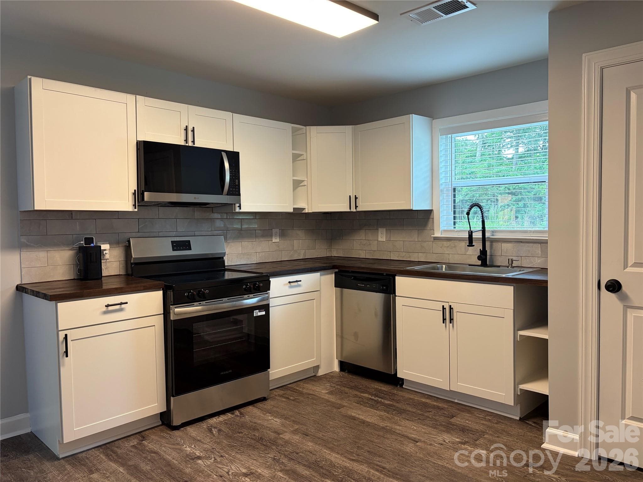 Single Family Residence at 8761 Old Wire Road, Laurel Hill, photo 4 of 12