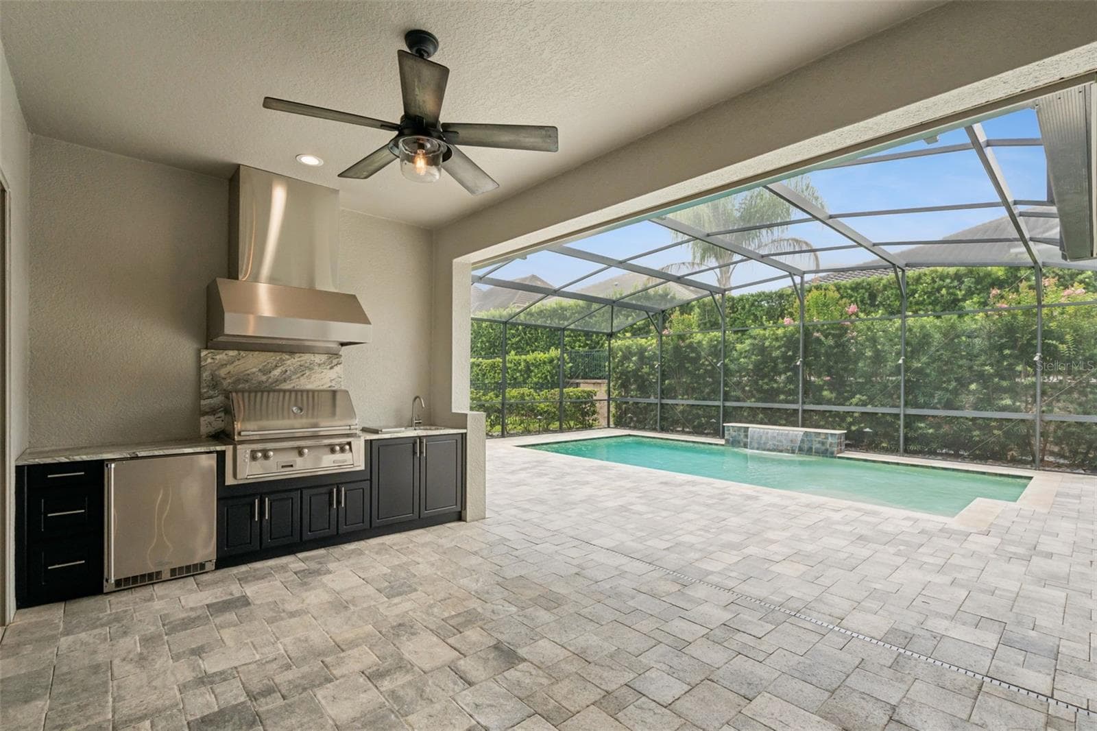 Screened lanai with summer kitchen - 1417 OIL LAMP CV, LAKE MARY