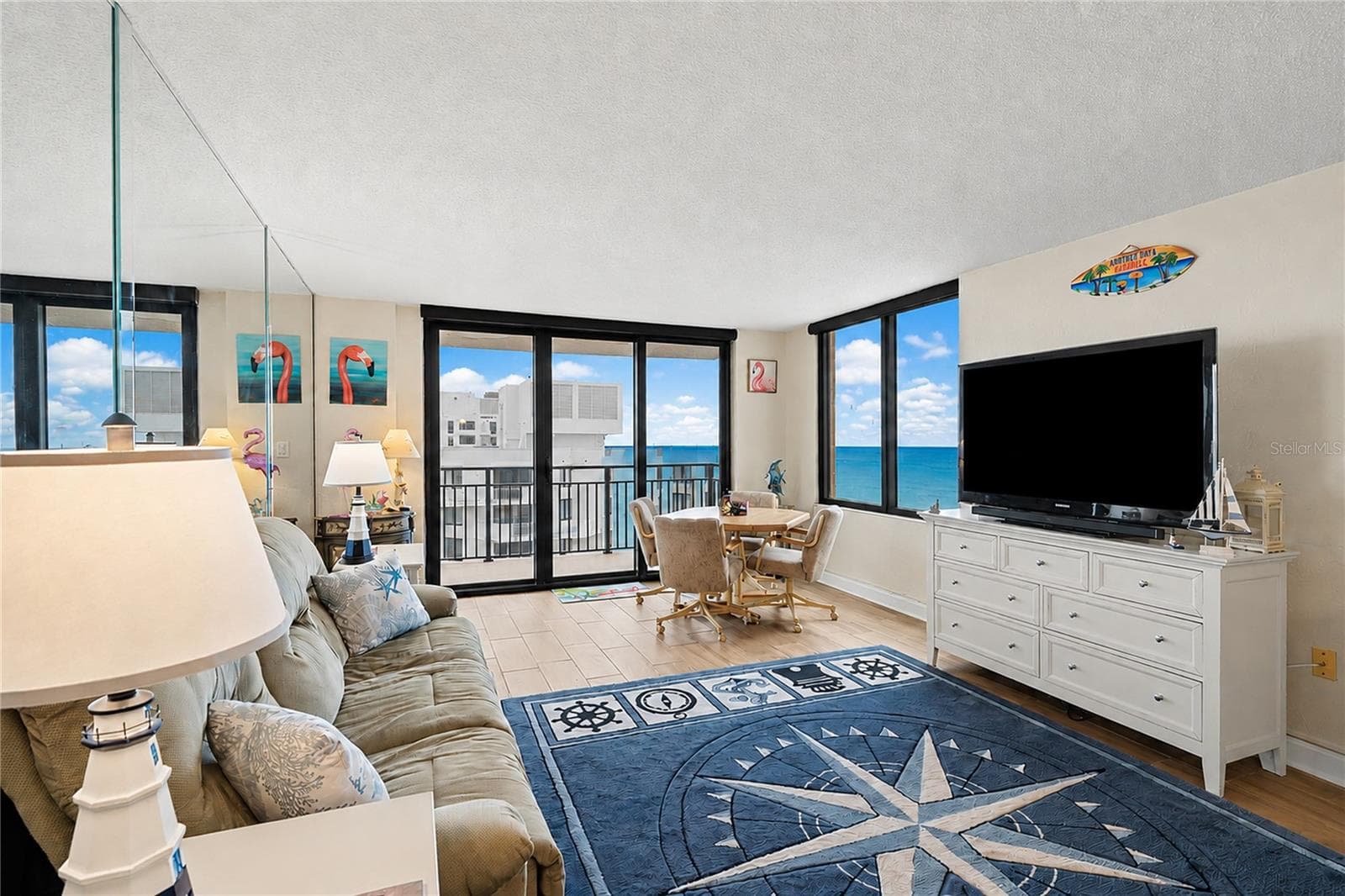 Entire condo has tile flooring made to look like wood. - 3051 S ATLANTIC AVE #V060, DAYTONA BEACH SHORES