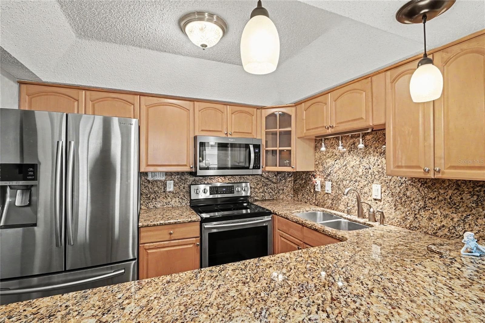 Granite counters and stainless steel appliances - 3051 S ATLANTIC AVE #V060, DAYTONA BEACH SHORES