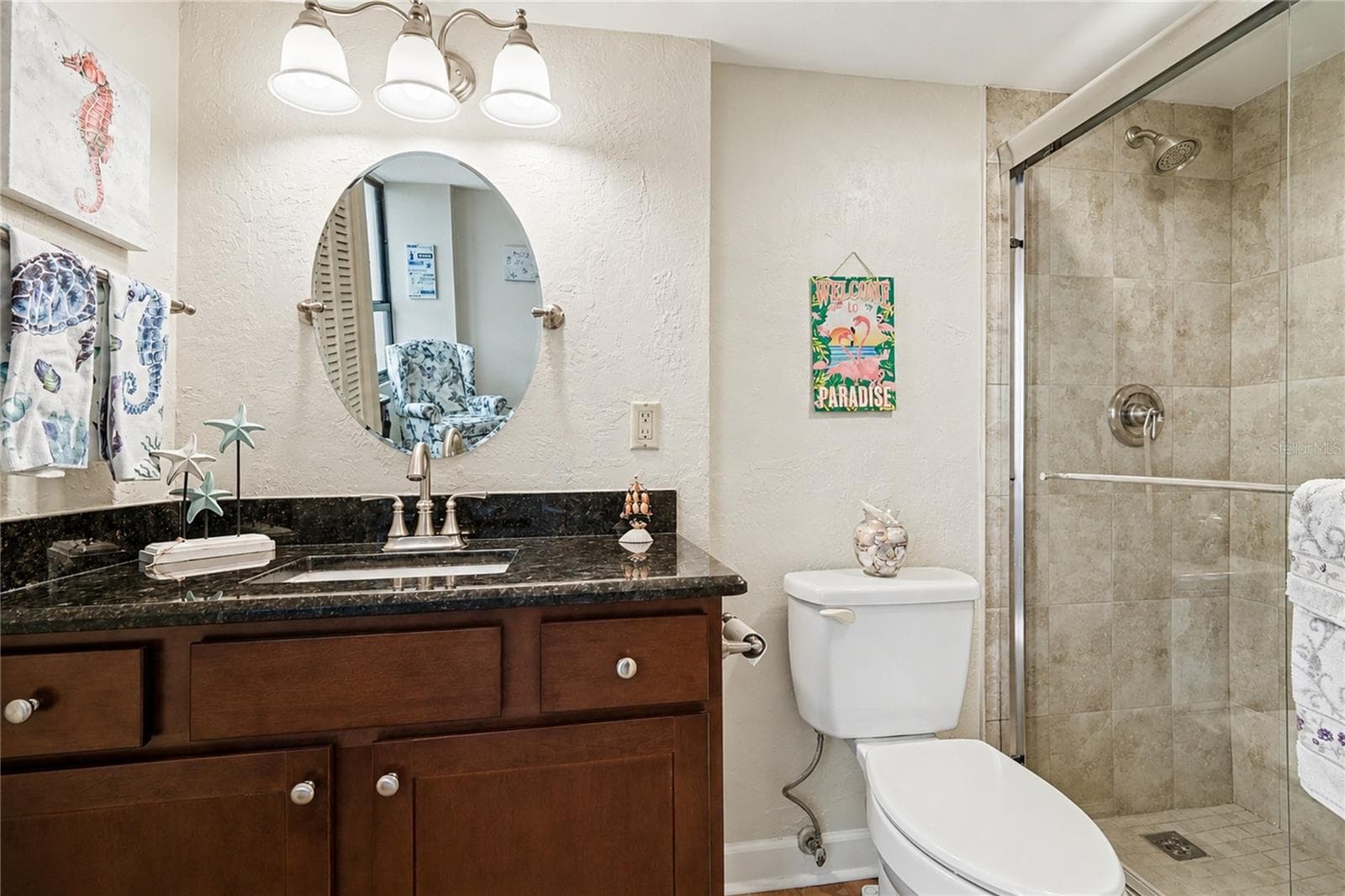 Guest suite bath with walk-in shower. - 3051 S ATLANTIC AVE #V060, DAYTONA BEACH SHORES