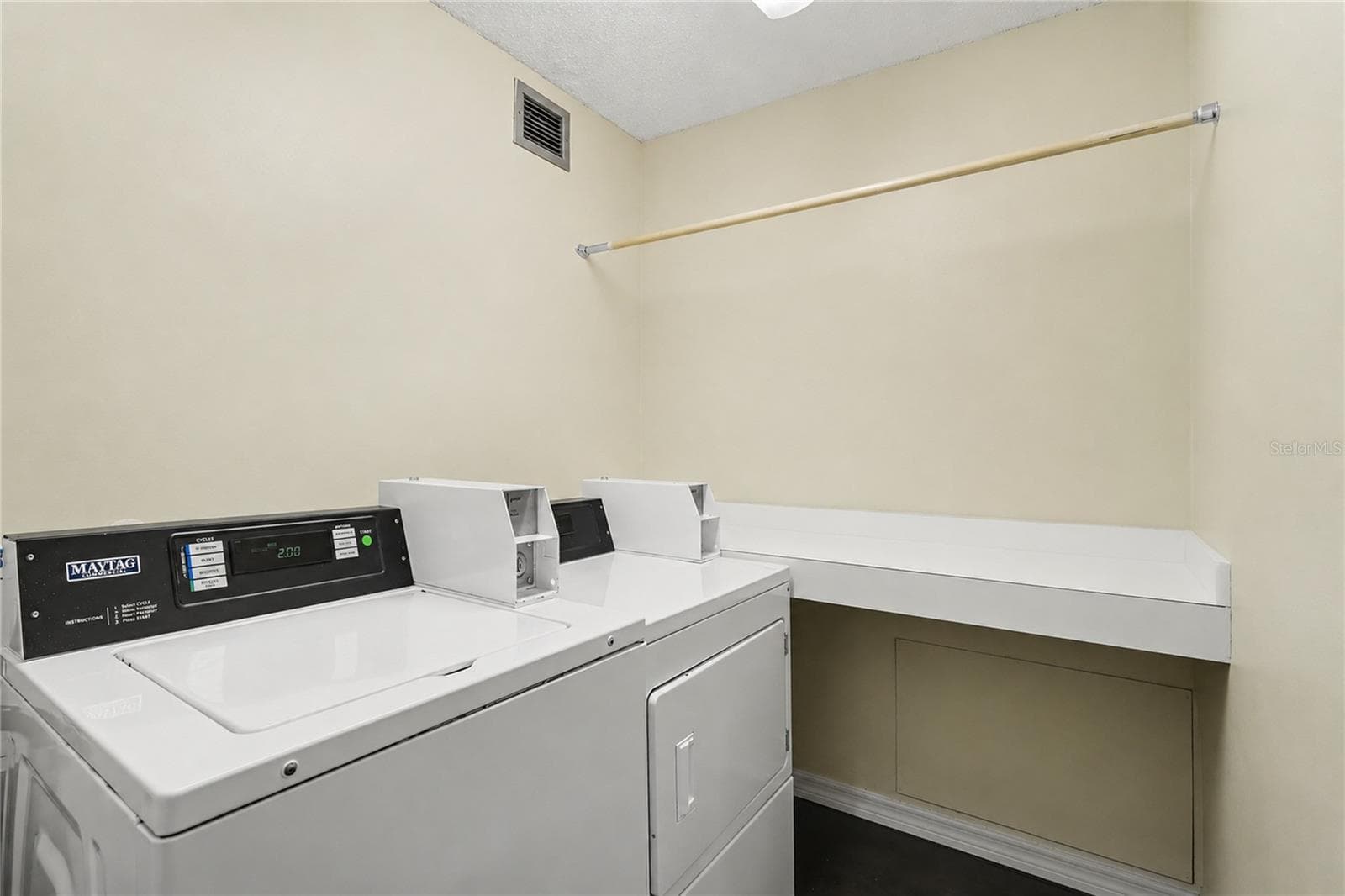 Laundry room just outside of the unit make it easily aaccessible. - 3051 S ATLANTIC AVE #V060, DAYTONA BEACH SHORES