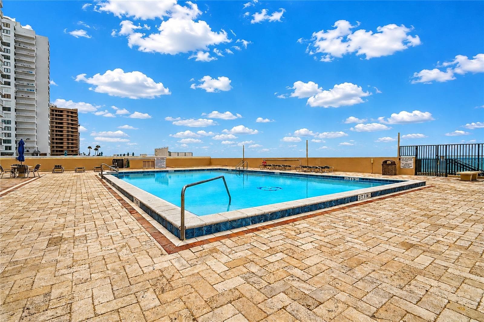 Lovely lap pool with pleny of deck area. - 3051 S ATLANTIC AVE #V060, DAYTONA BEACH SHORES