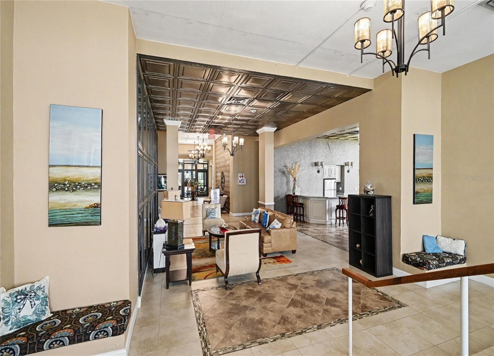 Lobby with kitchen area, library room, and bathrooms. - 3051 S ATLANTIC AVE #V060, DAYTONA BEACH SHORES