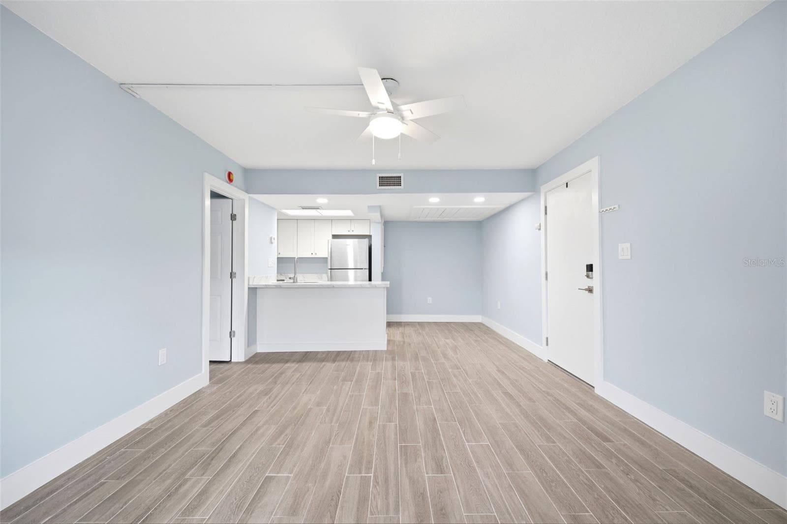View of Kitchen from Living Room - 5242 OPAL LN #104, NEW PORT RICHEY