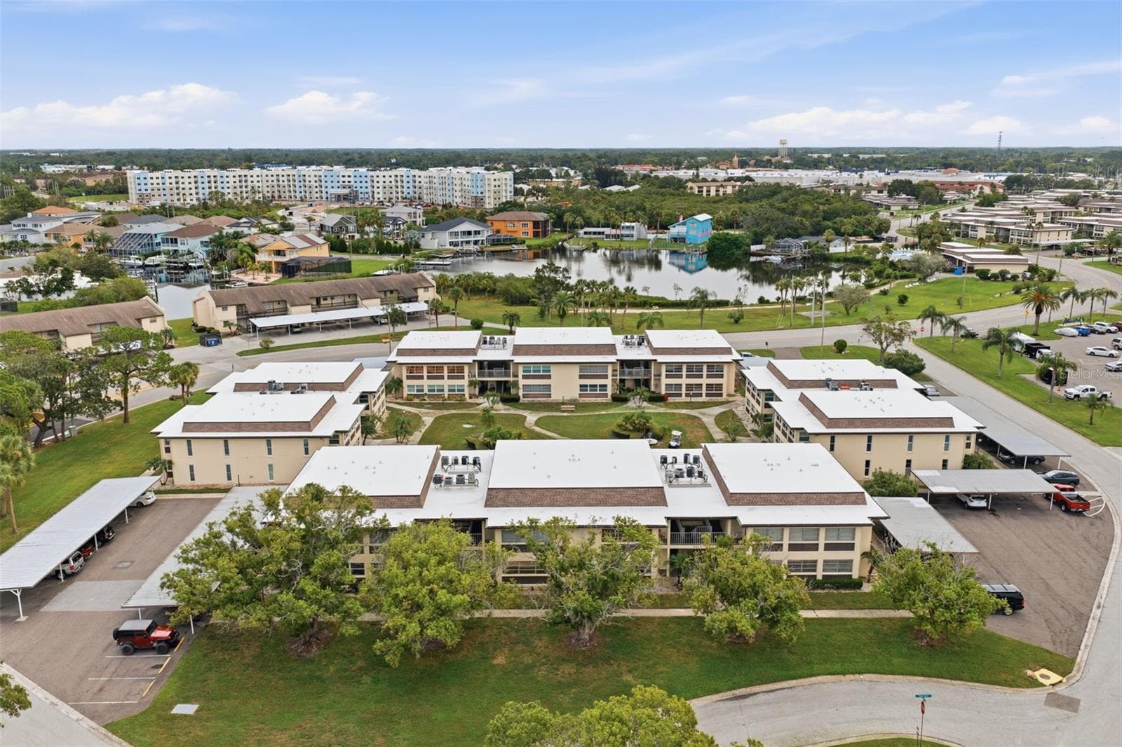 Aerial View of Building and Carport - 5242 OPAL LN #104, NEW PORT RICHEY