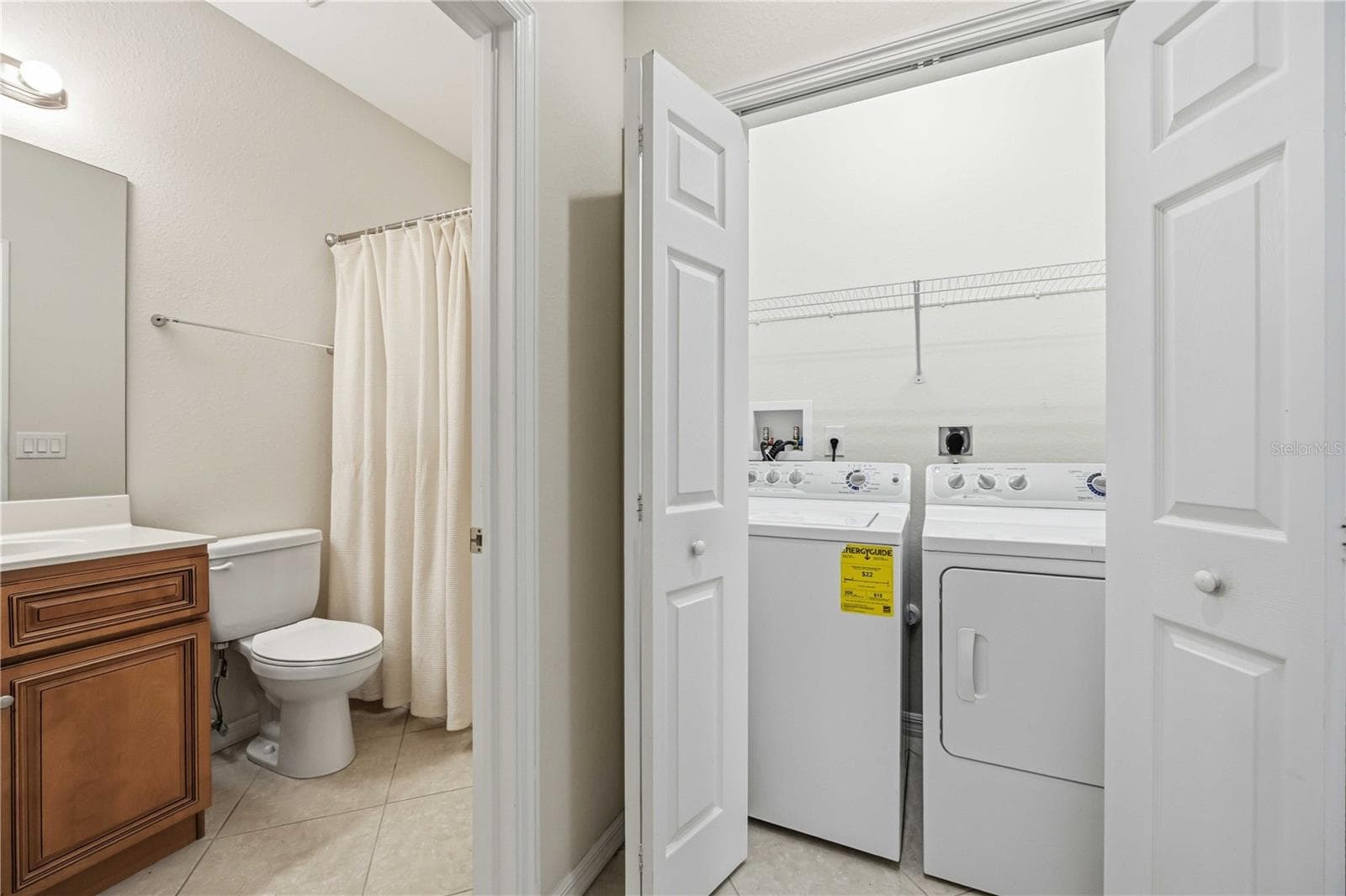 second bathroom and laundry room - 1914 SCARLETT AVE, NORTH PORT