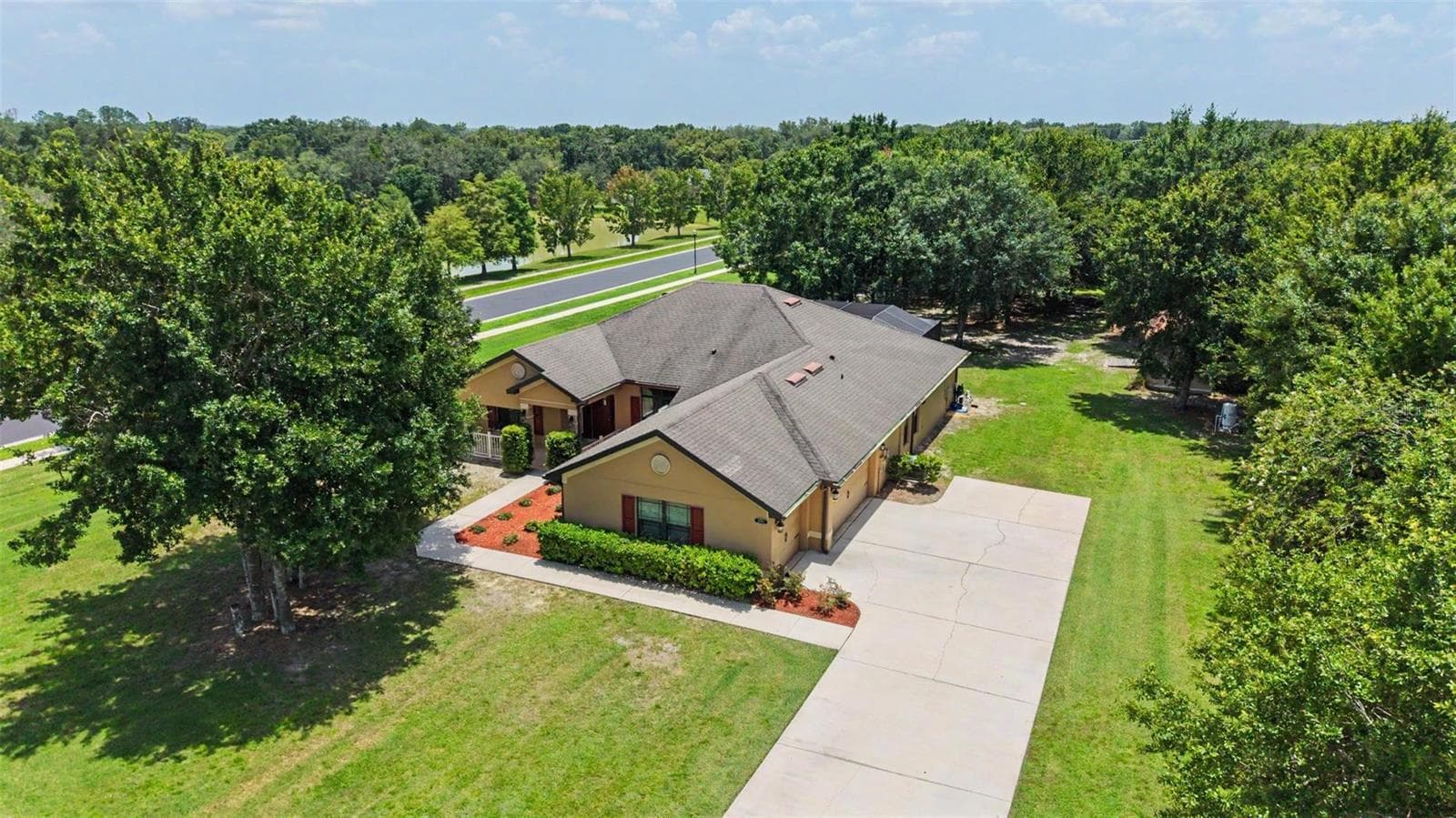 Aerial View of the Home and Large Driveway - 27928 AUSTIN WOODS DRIVE, DADE CITY