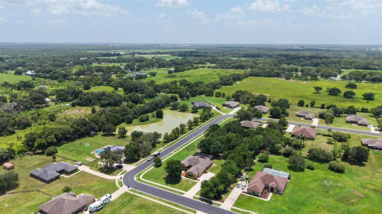 Aerial View of the Home and Neighborhood - 27928 AUSTIN WOODS DRIVE, DADE CITY
