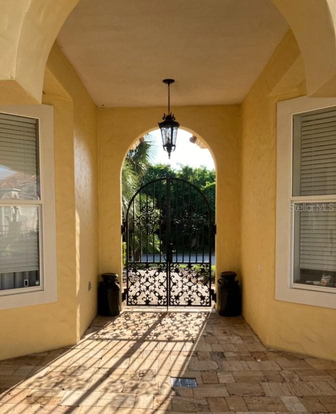 Beautiful wrought iron gates facing east - 88 HIDDEN CV, FLAGLER BEACH