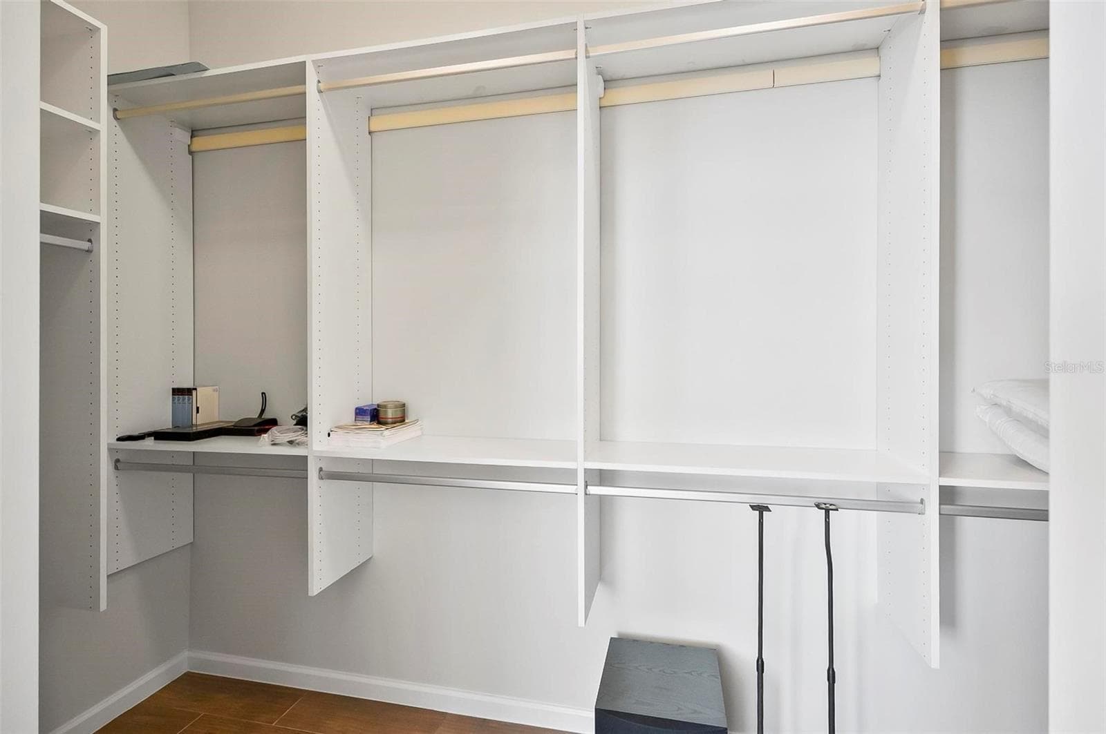 Primary bedroom closet with custom shelving - 88 HIDDEN CV, FLAGLER BEACH