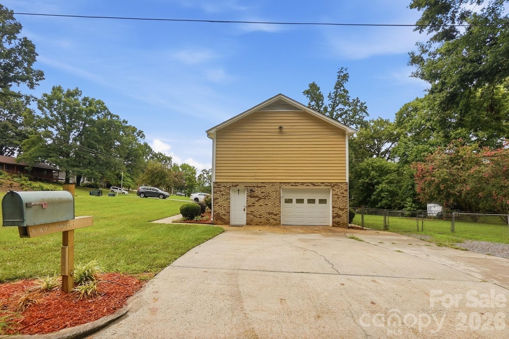Long side-load garage allows for ample parking - 2600 Providence Drive, Gastonia