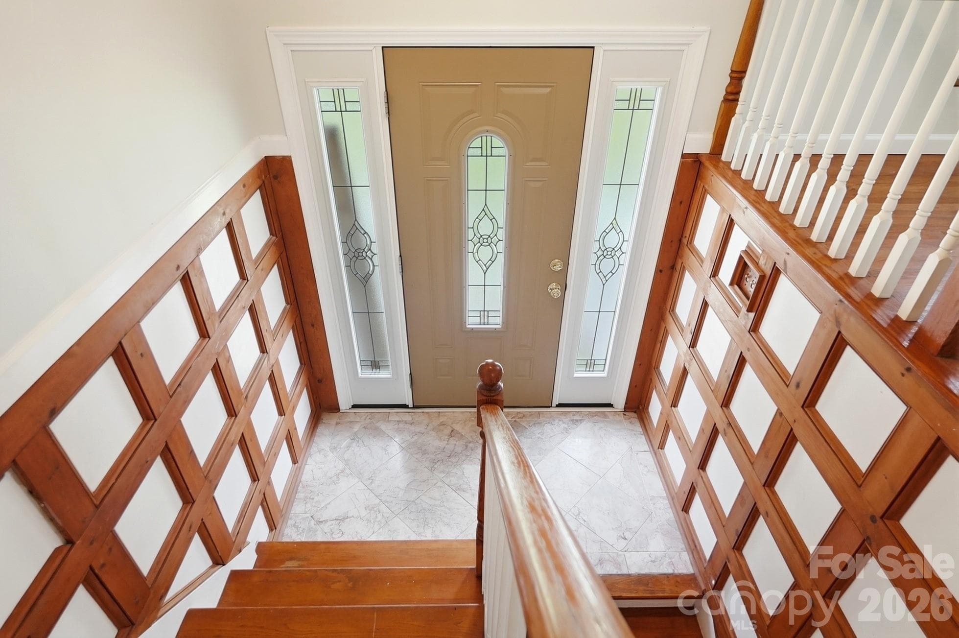 Custom wood work adorns the foyer - 2600 Providence Drive, Gastonia
