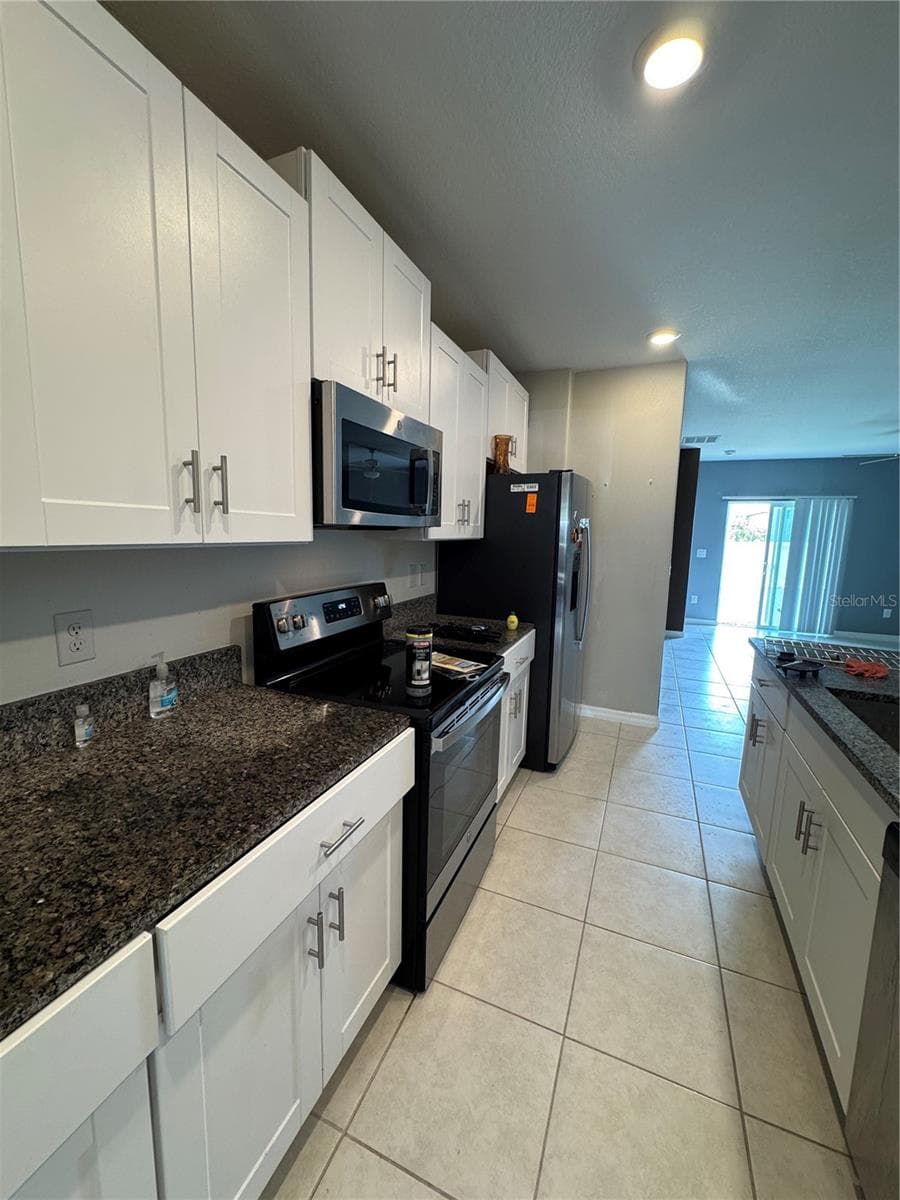 Single Family Residence at 36569 SMITHFIELD LN, ZEPHYRHILLS, photo 6 of 30