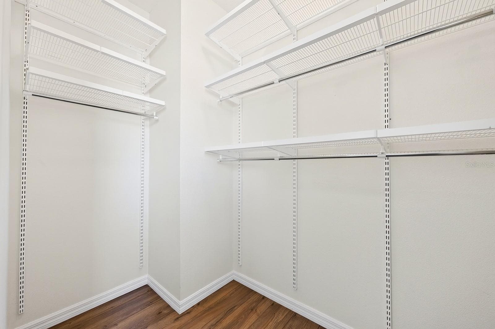 Spacious second bedroom walk-in closet. - 11429 BROWNSTONE ST, WINDERMERE