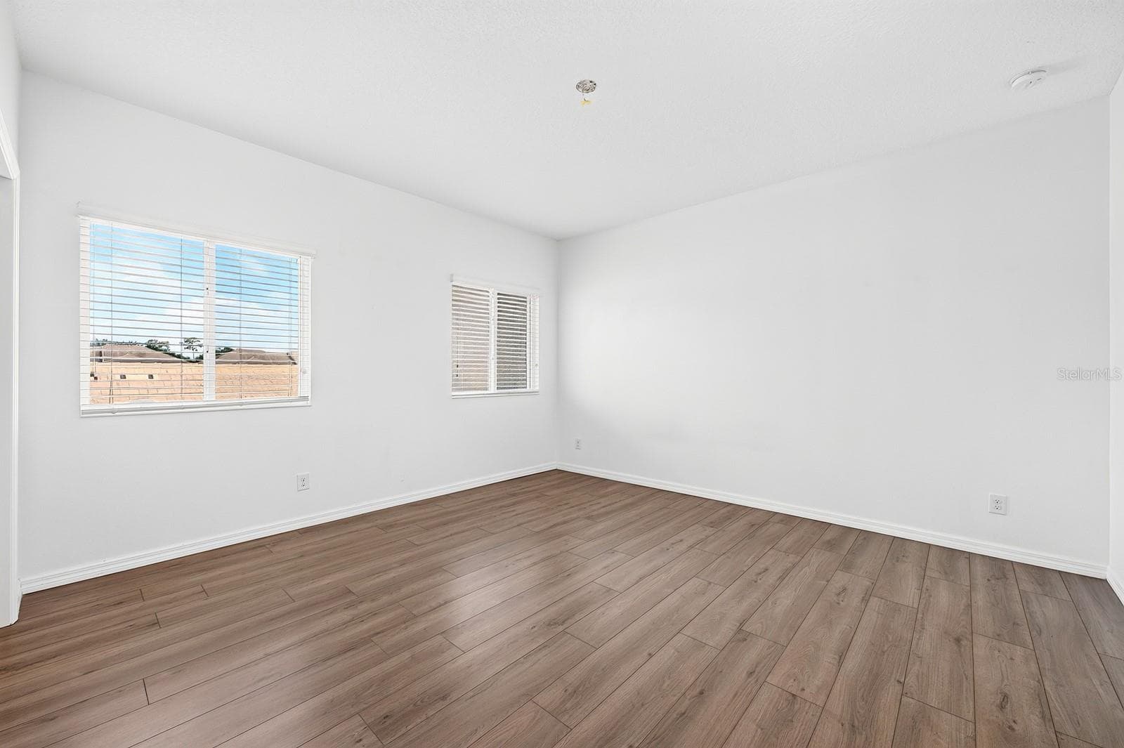 Large guest bedroom. - 11429 BROWNSTONE ST, WINDERMERE