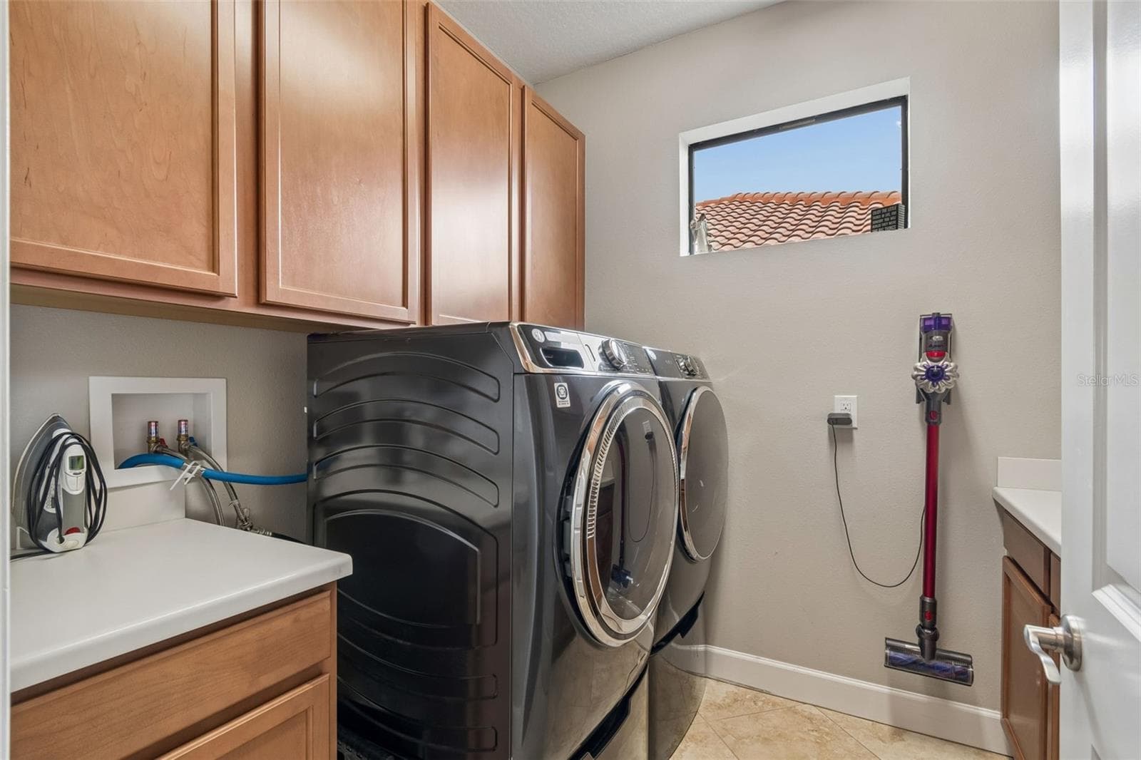 Spacious laundry with storage - 11503 CALLISIA DR, ODESSA