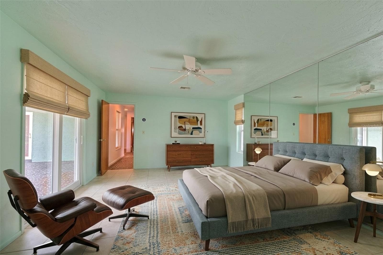 Virtually staged - Master Bedroom  overlooking waterfront and rock garden - 7102 MANDY LN, NEW PORT RICHEY