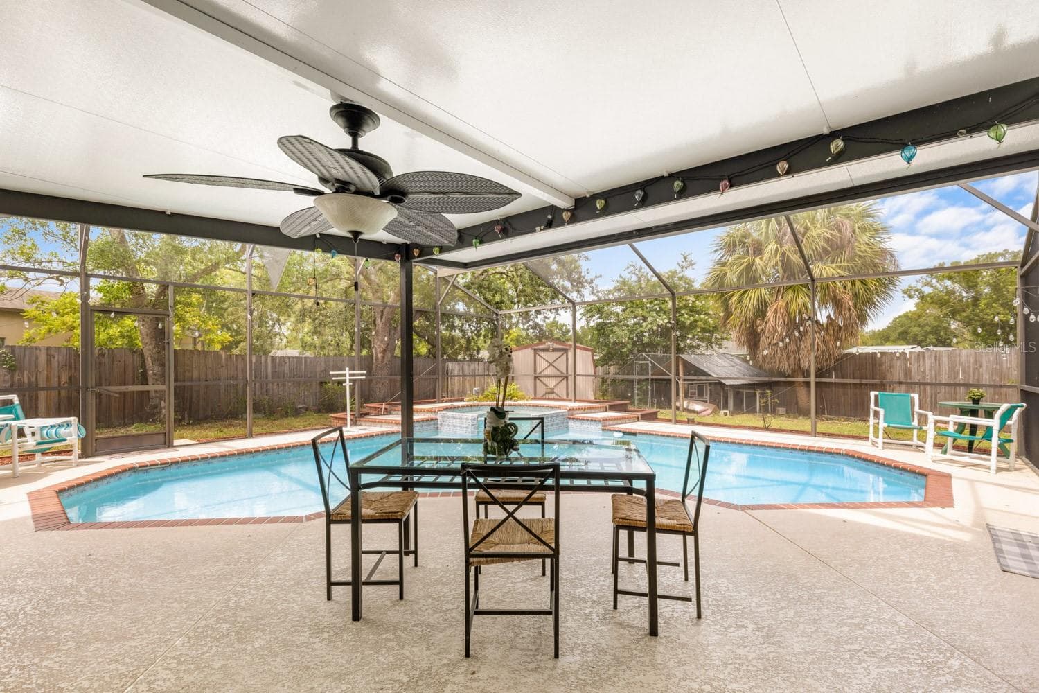 Sparkling pool with back patio - 8243 PAMLICO ST, ORLANDO