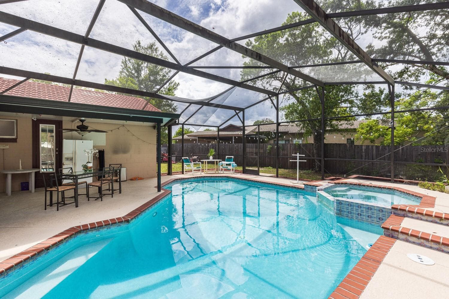 Sparkling pool and back patio - 8243 PAMLICO ST, ORLANDO