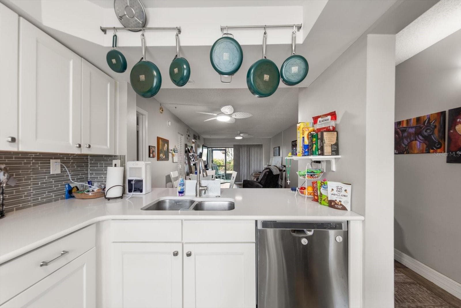 KITCHEN VIEW TO LIVING ROOM - 6219 PALMA DEL MAR BLVD S #102, ST PETERSBURG