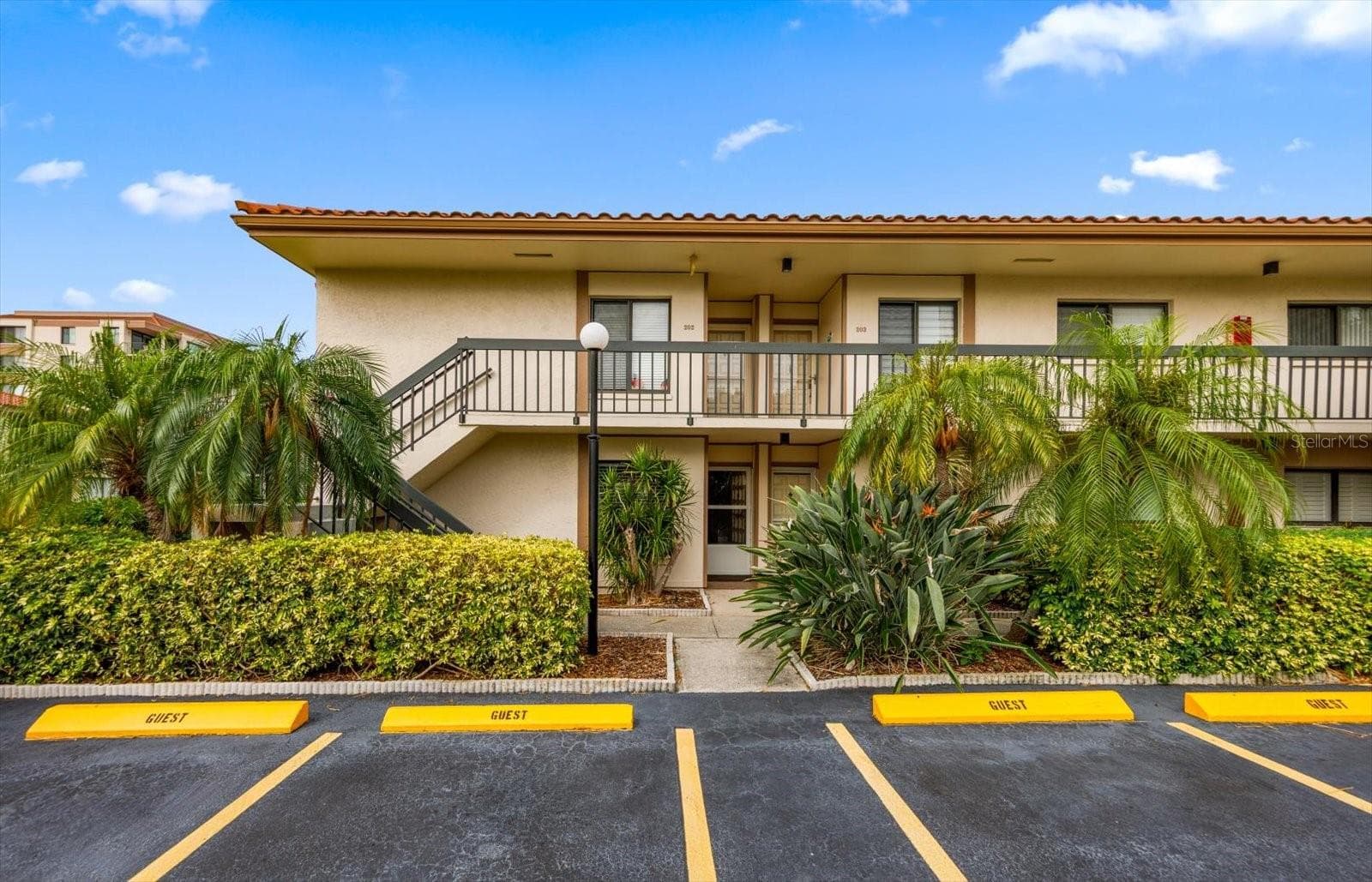 BUILDING D FRONT EXTERIOR w/GUEST PARKING SPACES - 6219 PALMA DEL MAR BLVD S #102, ST PETERSBURG