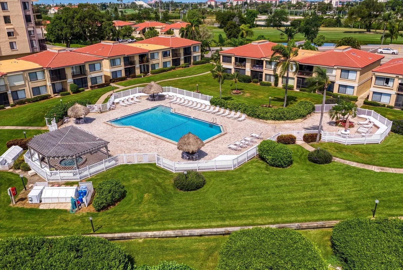 AERIAL VIEW OF COMMUNITY POOL - 6219 PALMA DEL MAR BLVD S #102, ST PETERSBURG
