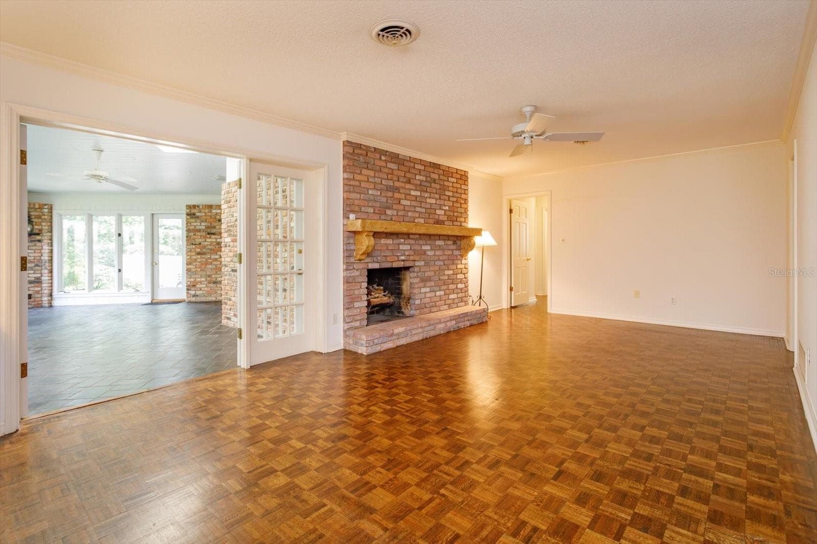 Family Room with french doors to Florida Room - 5019 GRAN LAC AVE, ORLANDO
