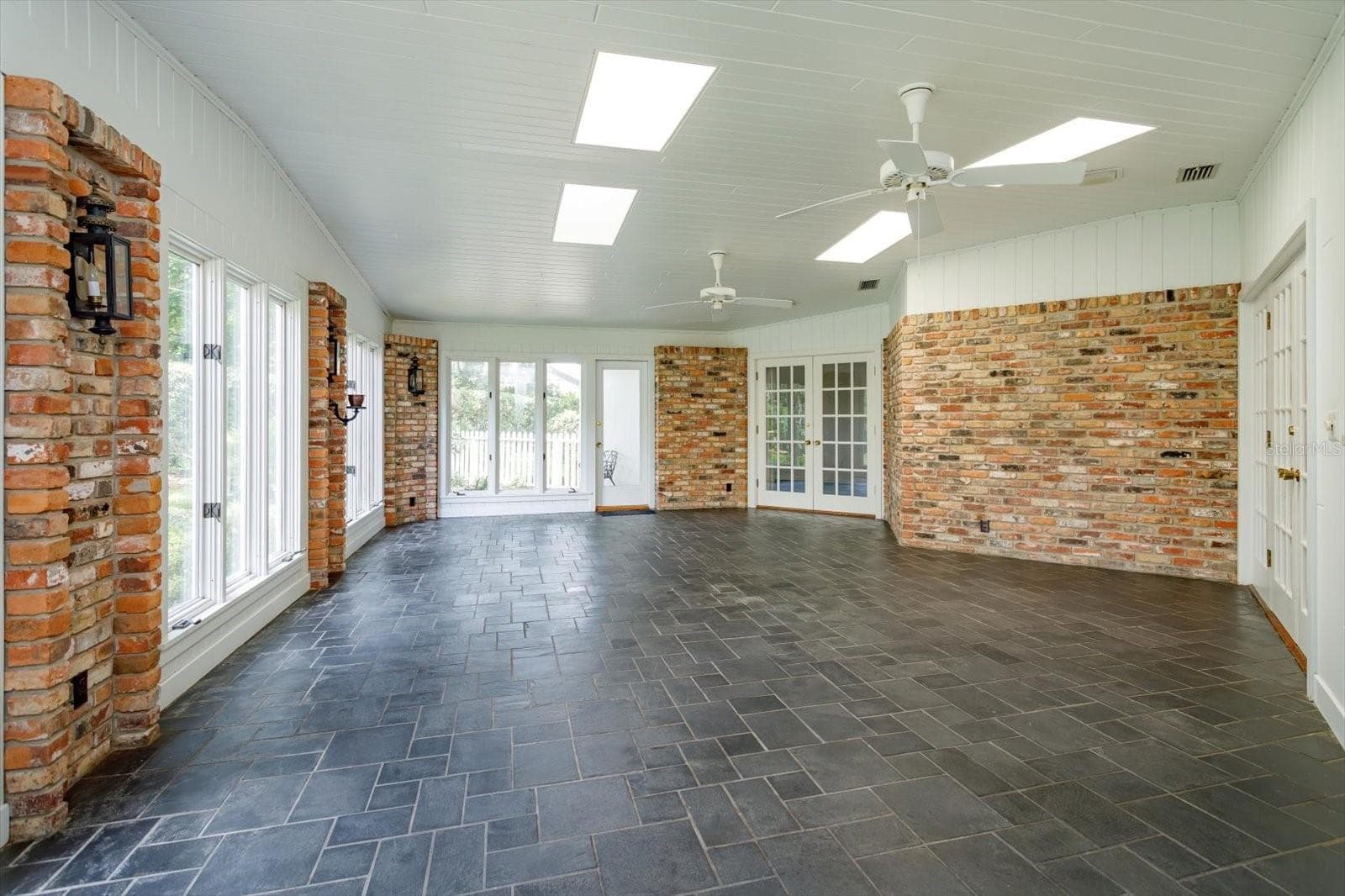 Florida Room has door to yard and open to Kitchen, Family and Breakfast rooms - 5019 GRAN LAC AVE, ORLANDO