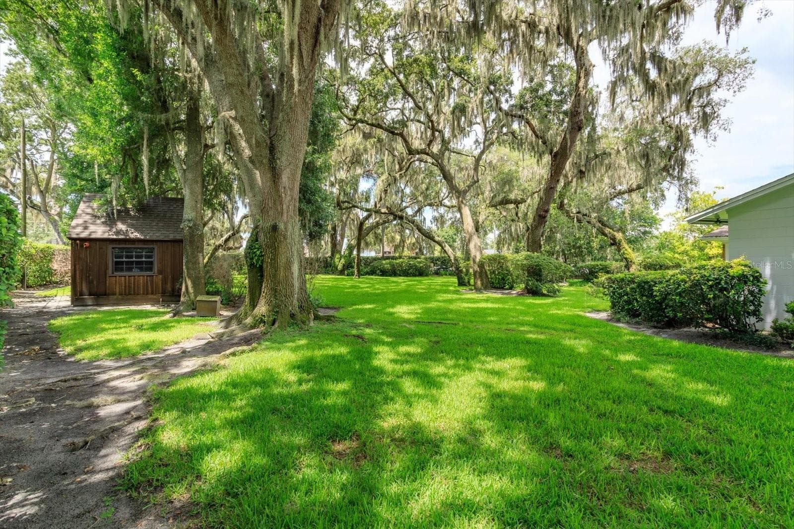 Rear yard showing Garden Shed - 5019 GRAN LAC AVE, ORLANDO