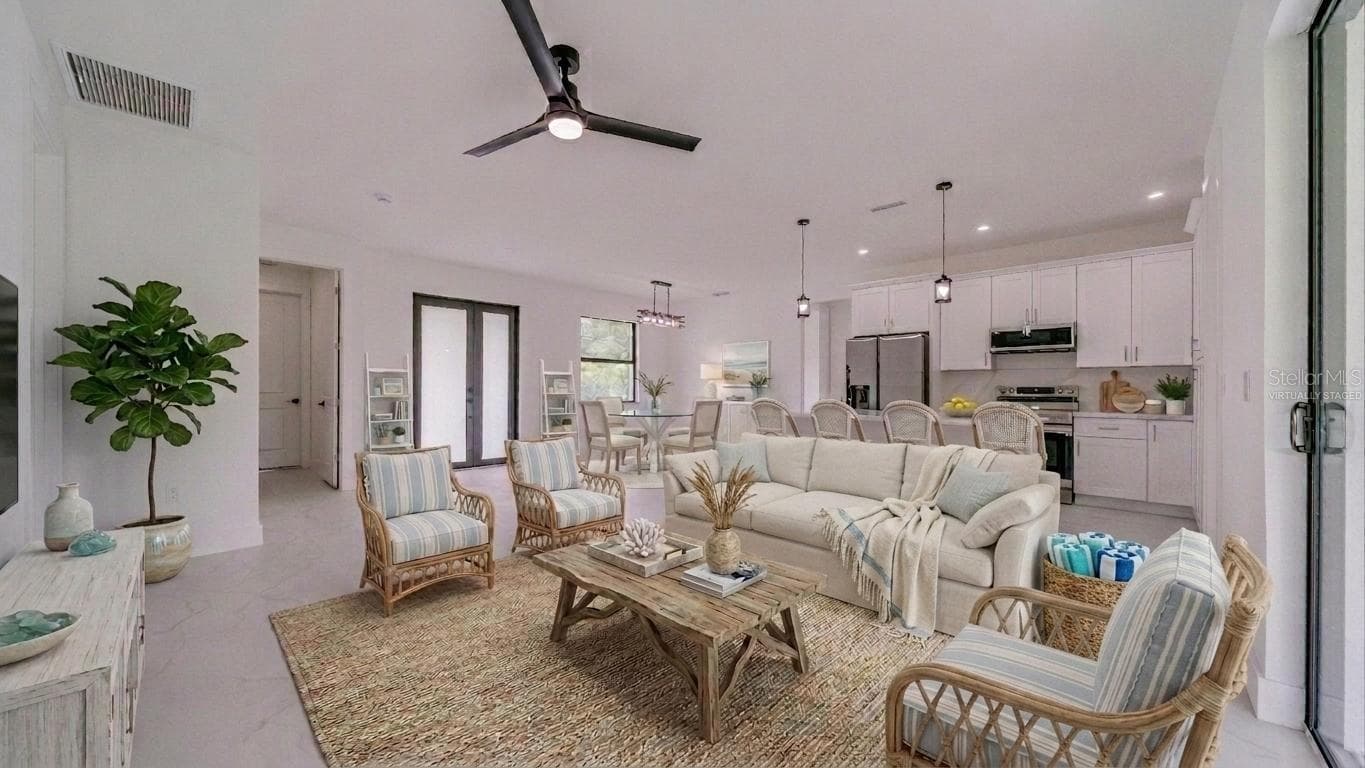 Space to relax and entertain. (Virtually staged) - 2713 8TH ST W, LEHIGH ACRES