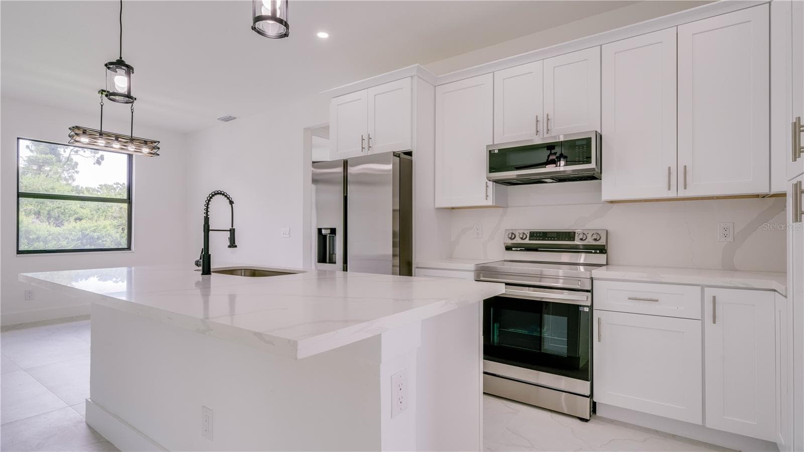 All cabinetry and drawers are soft close. - 2713 8TH ST W, LEHIGH ACRES