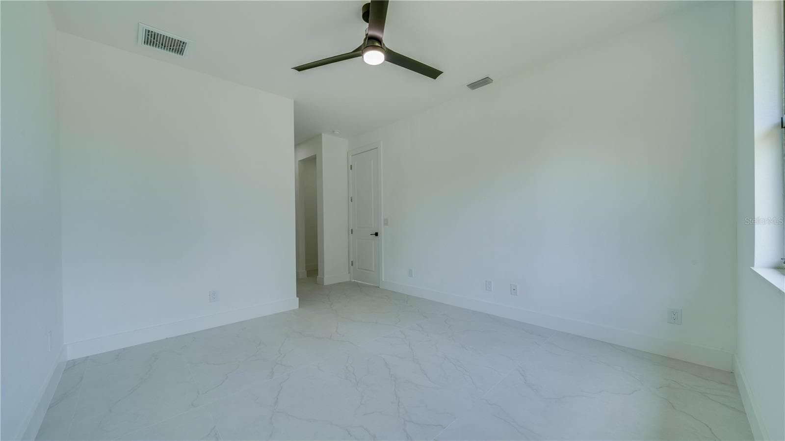 View looking at the entrance to the room. - 2713 8TH ST W, LEHIGH ACRES
