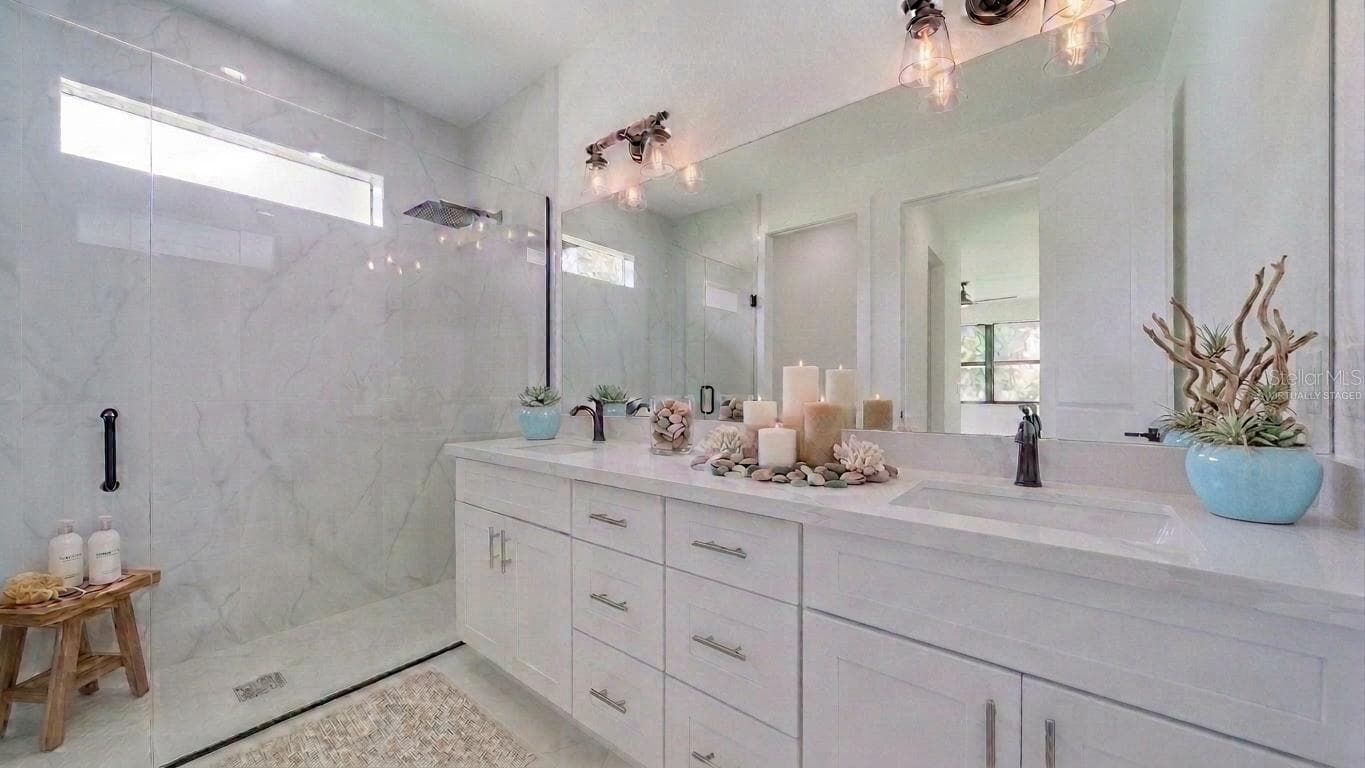 Dual vanity/sinks with a gorgeous all tile walk-in rain shower! (Virtually staged) - 2713 8TH ST W, LEHIGH ACRES