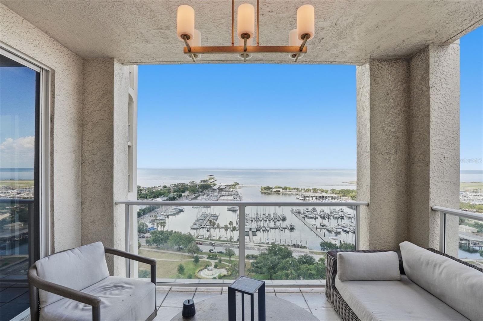 Enjoy the view of Tampa Bay, the Marina and South Straub Park from one of four balconies here at residence 1900 in The Florencia condominium - 100 BEACH DR NE #1900, ST PETERSBURG