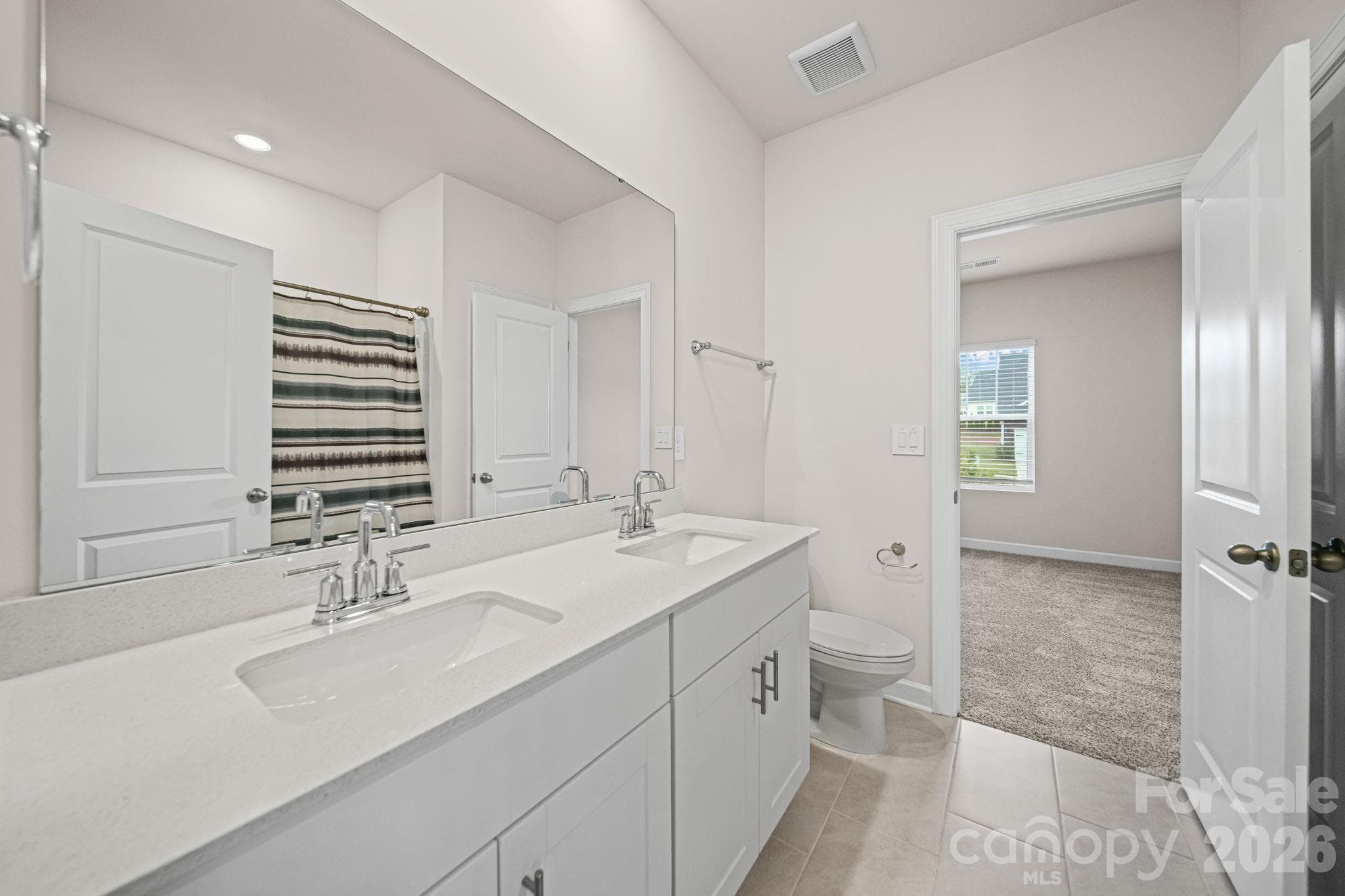 double vanity in jack and Jill - 6220 Barcelona Way, Charlotte