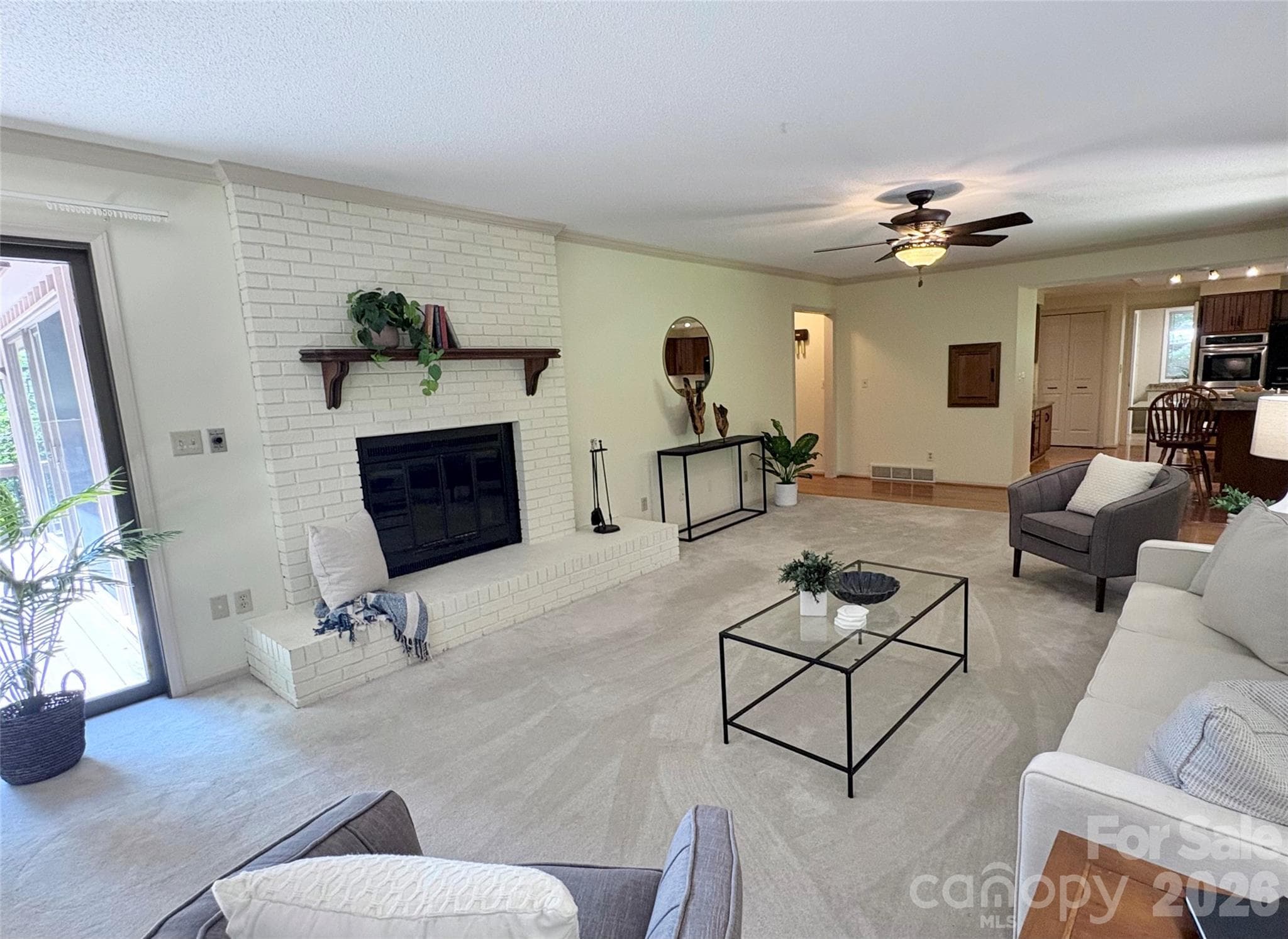 main level Family room with wood burning fireplace - 115 Woodhaven Drive, Hendersonville