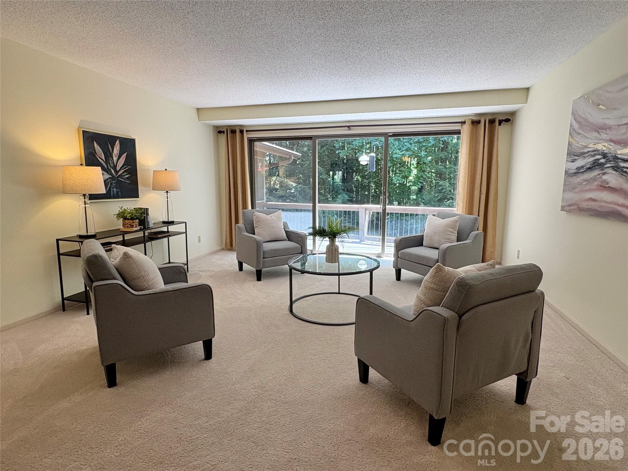 from foyer, looking toward Formal Living Room with wall of glass doors that open to Deck - Hendersonville