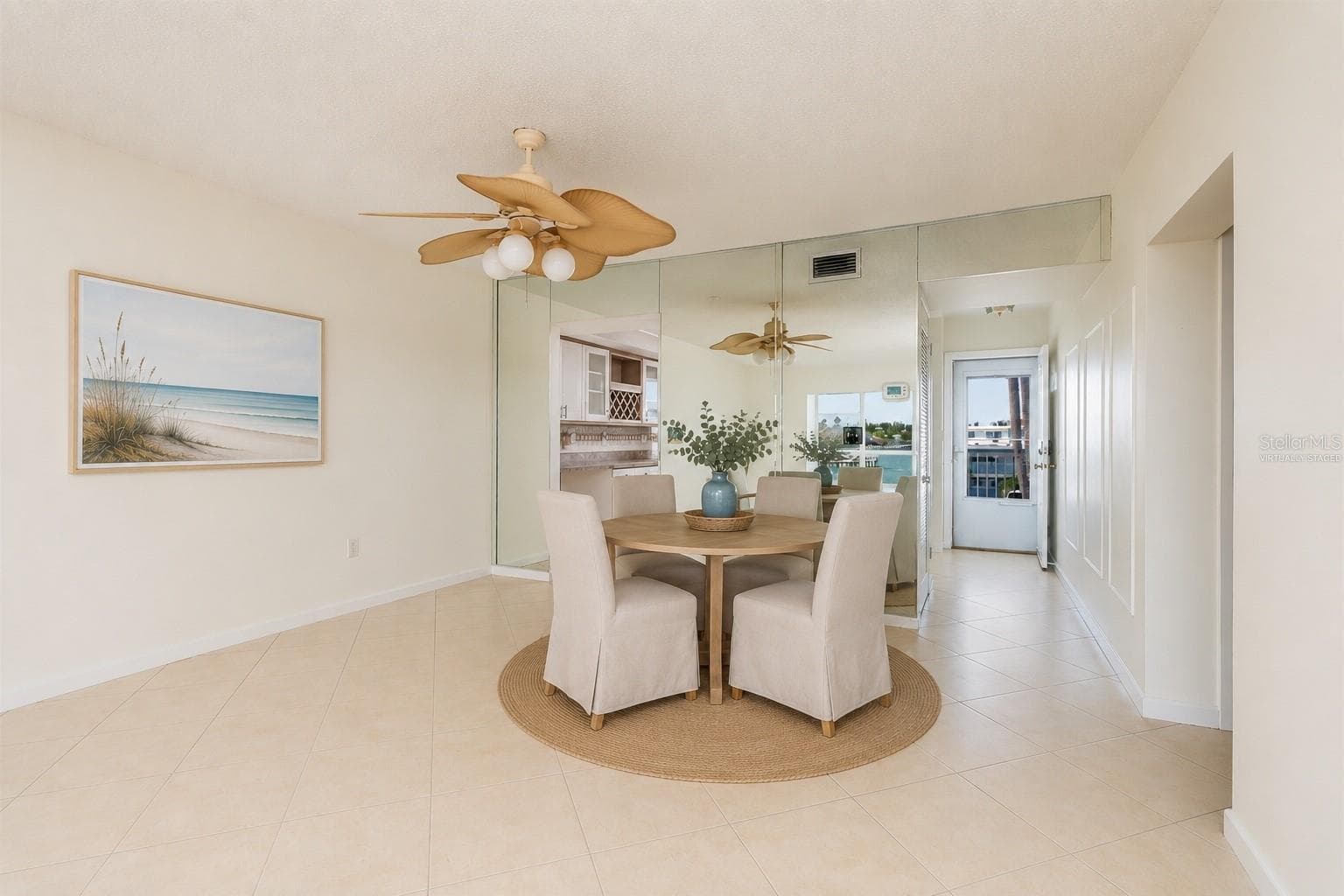 Virtually Staged Dining area. Tile Flooring. - 6061 2ND ST E #55, ST PETE BEACH