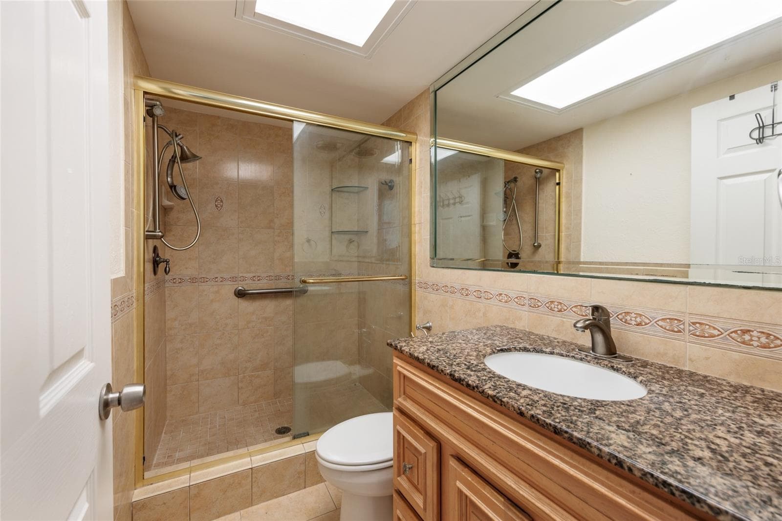2nd Bathroom w/Shower & exhaust fan. Linen closet in hallway. - 6061 2ND ST E #55, ST PETE BEACH